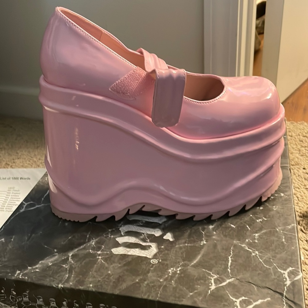 Light pink platform shoe.